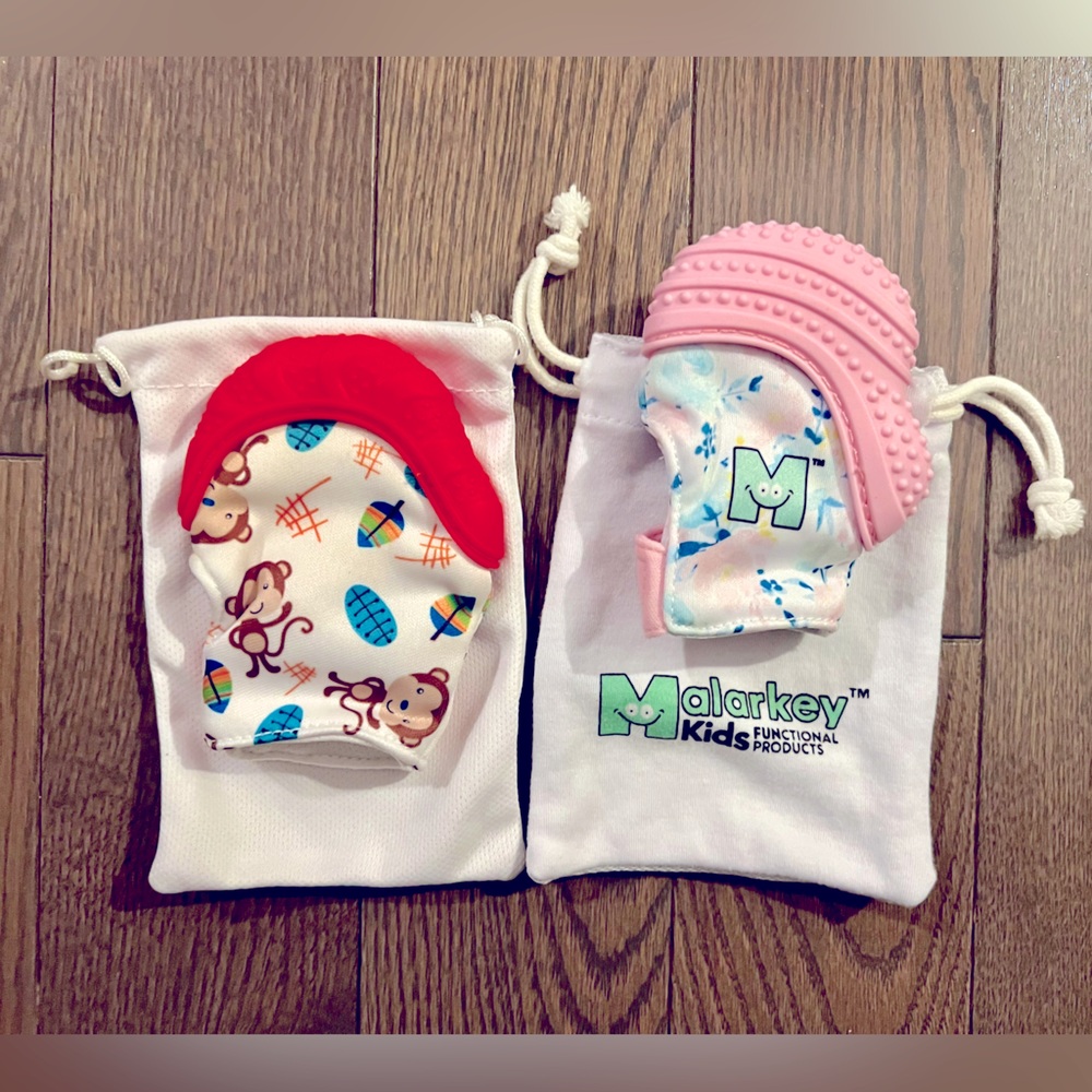 Pink and Red Teething Mittens with carrying cases